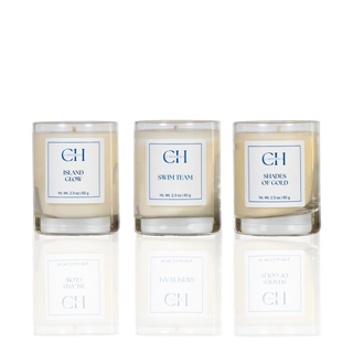 Three candles with labels on a white background